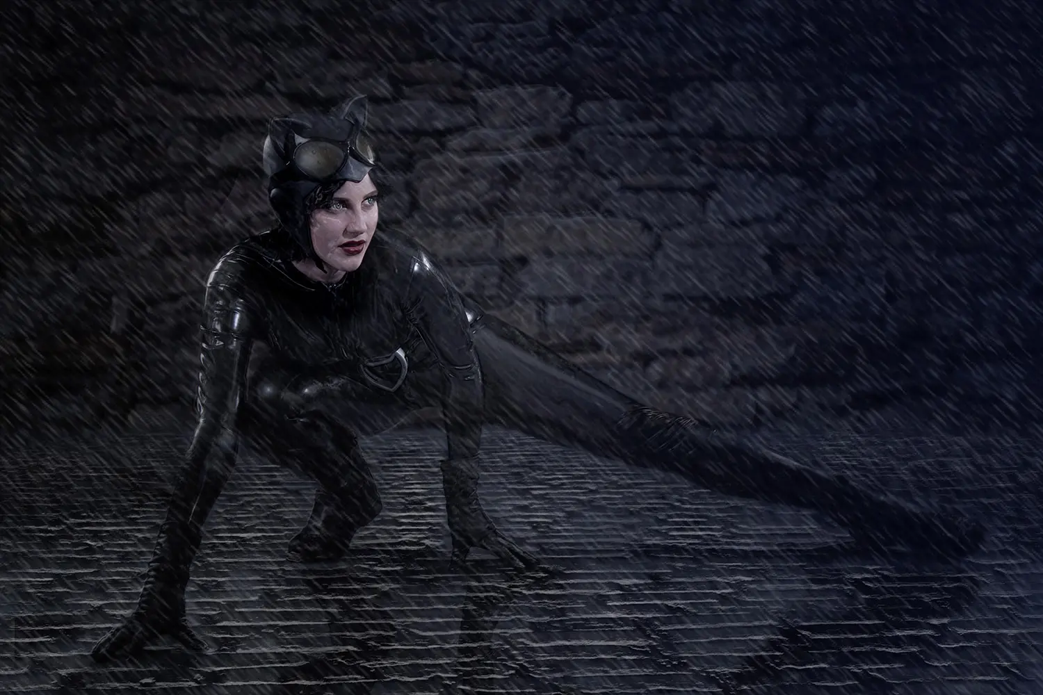 Cosplay catwoman in PVC suit on cobbled street in the rain