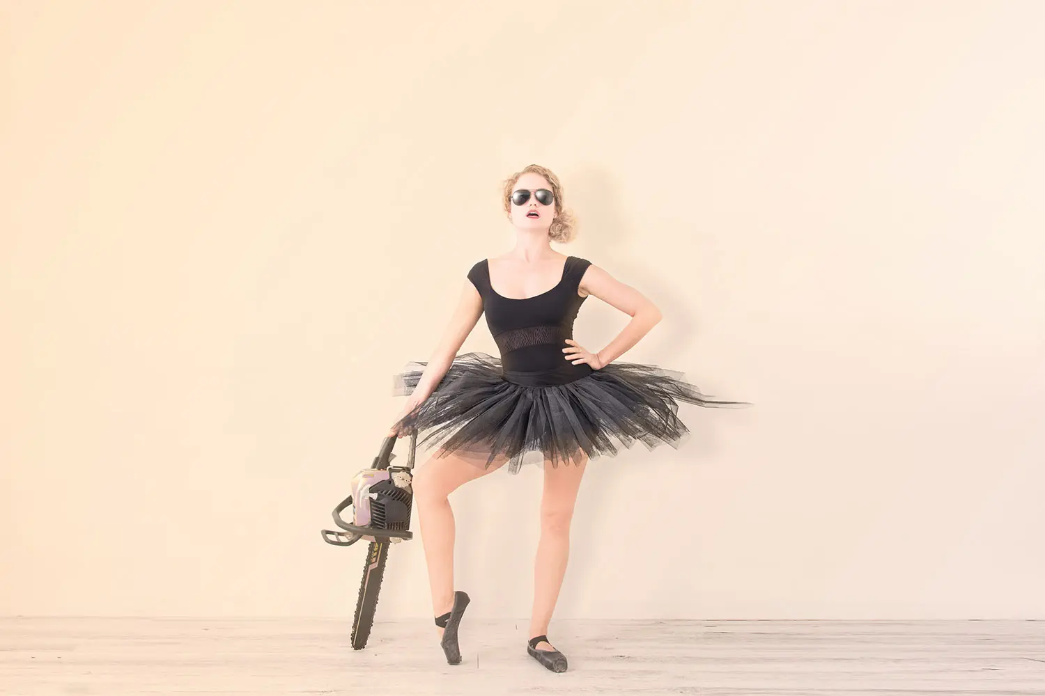 Ballet dancer with a chainsaw